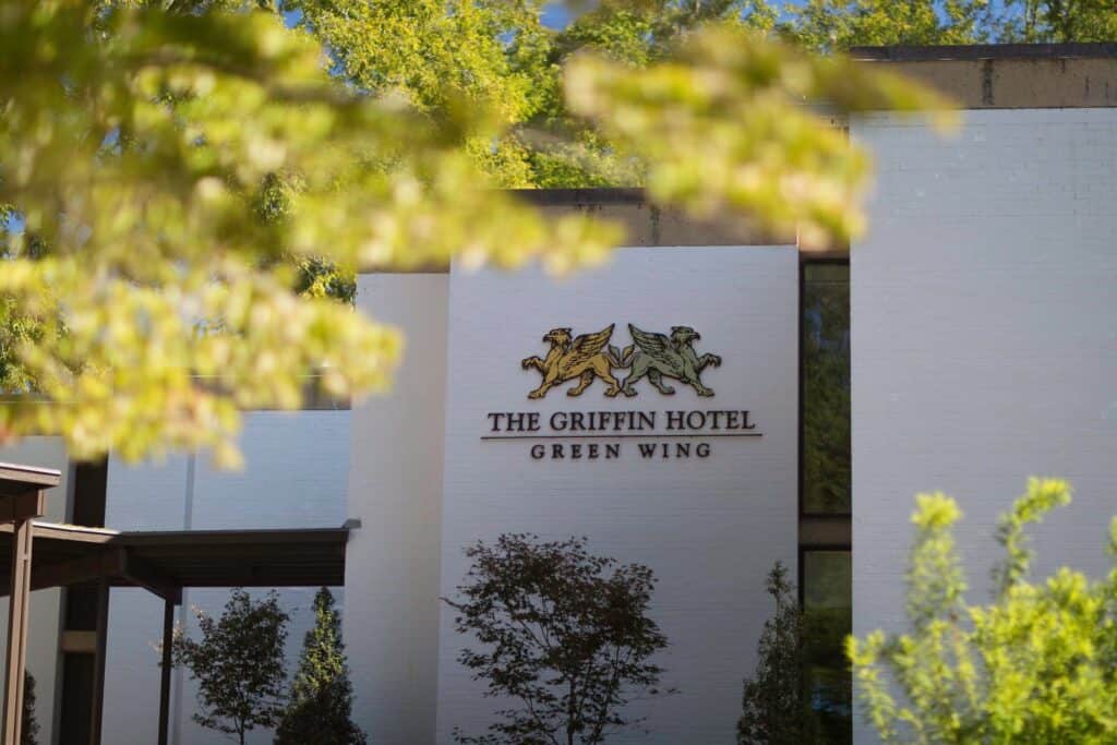 Colonial Williamsburg Griffin Hotel 2 Griffin Hotel signage view through the leaves